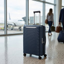 Valigia trolley espandibile Upscape 75 Blue nights Samsonite ambientazione